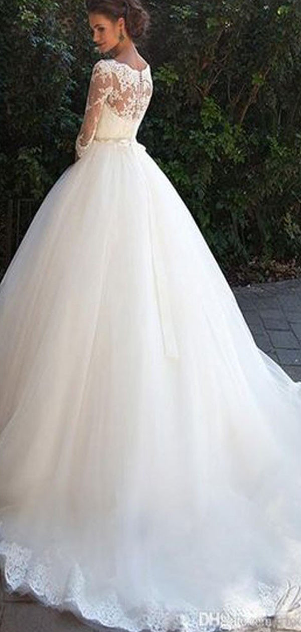 Abito da sposa elegante a pallone, scollo a cuore, manica tre quarti illusion, abito chiaroveggente in pizzo. WD0223