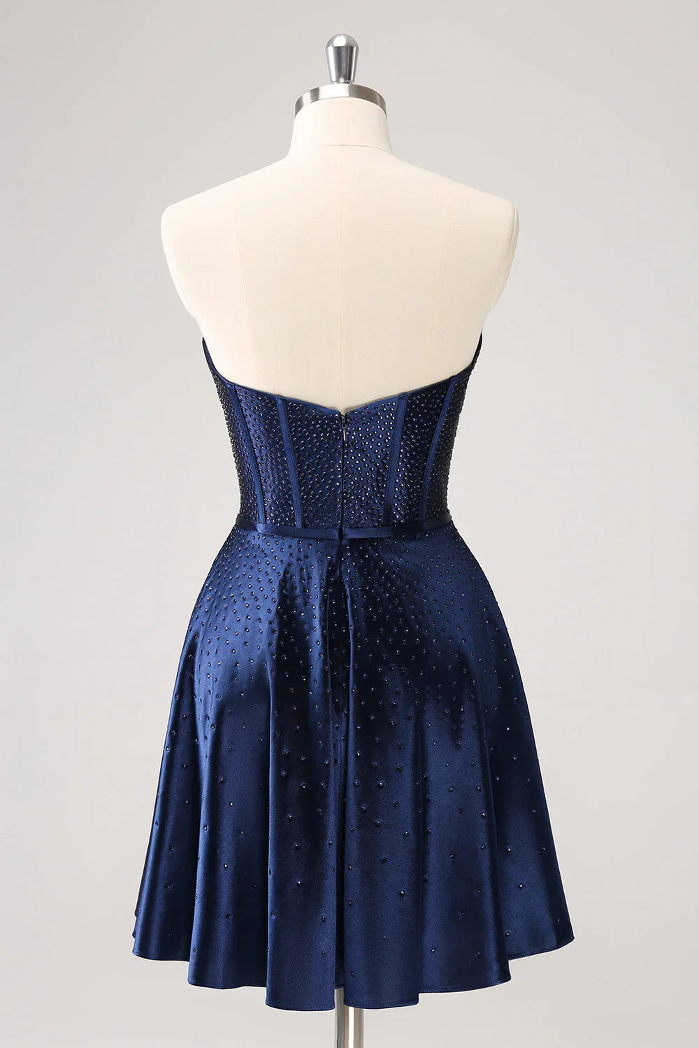 Niedliches marineblaues A-Linien-Trägerloses Hollow-Out-Korsett-Perlenkleid mit Schleife für den Homecoming