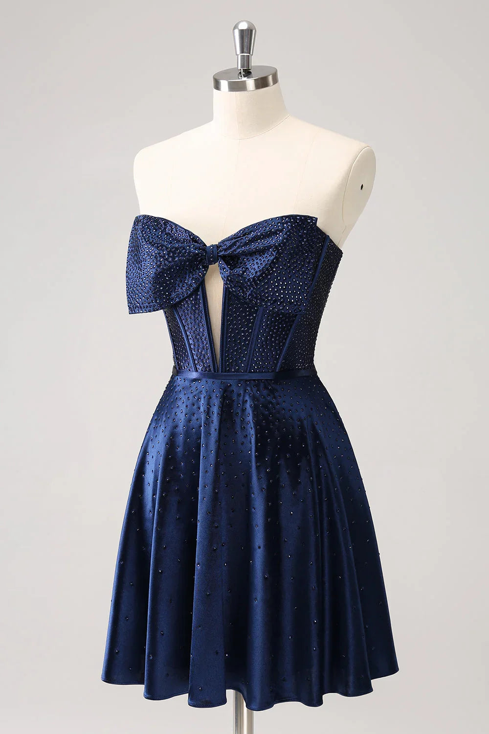 Niedliches marineblaues A-Linien-Trägerloses Hollow-Out-Korsett-Perlenkleid mit Schleife für den Homecoming