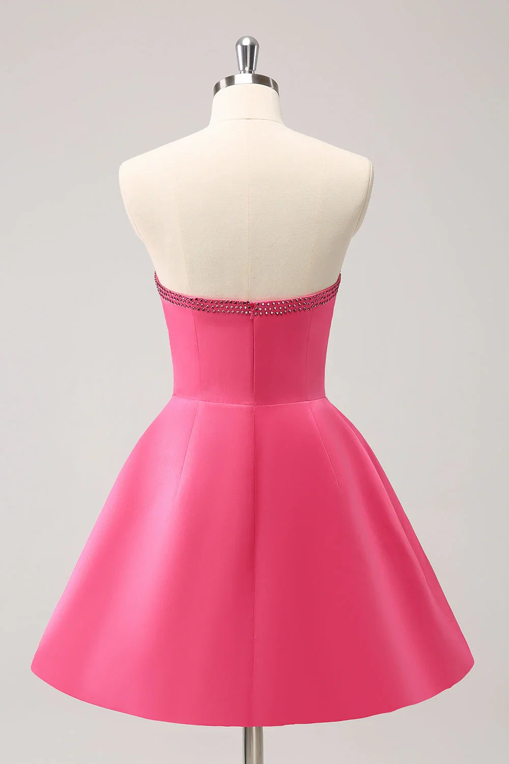 Niedliches knallpinkes A-Linien-Trägerloses Kleid mit Cut-Out und Perlen für den Homecoming