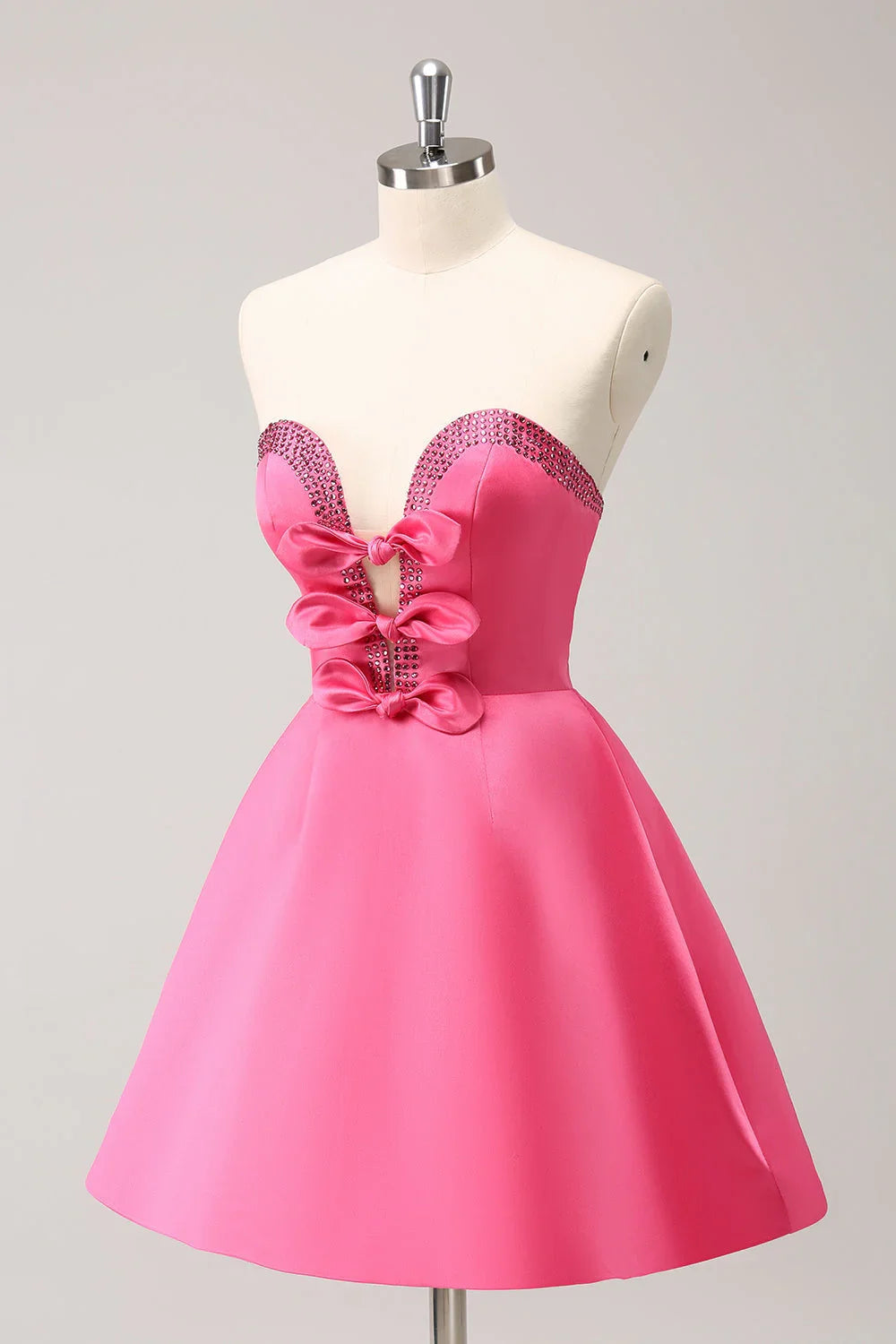 Niedliches knallpinkes A-Linien-Trägerloses Kleid mit Cut-Out und Perlen für den Homecoming