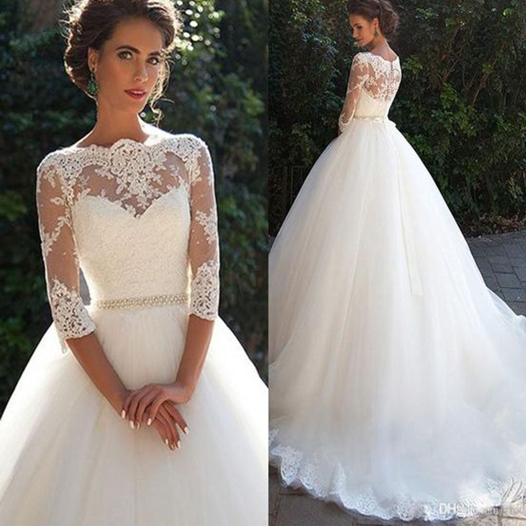 Abito da sposa elegante a pallone, scollo a cuore, manica tre quarti illusion, abito chiaroveggente in pizzo. WD0223