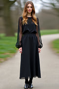 Robe de soirée noire en mousseline à manches et coupe A