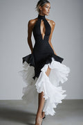Robe de soirée asymétrique échancrée noir et blanc avec volants