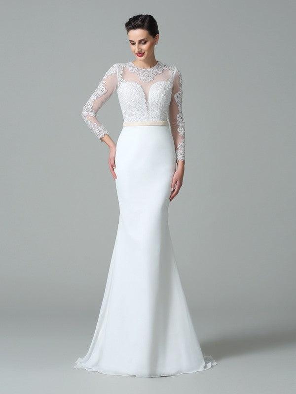 Robe de mariée en mousseline de soie à manches longues avec dentelle et ornements en forme de sirène