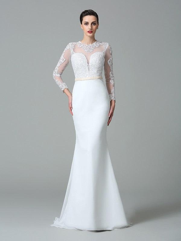 Robe de mariée en mousseline de soie à manches longues avec dentelle et ornements en forme de sirène