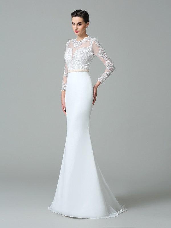 Robe de mariée en mousseline de soie à manches longues avec dentelle et ornements en forme de sirène
