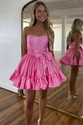 Robe de bal mignonne fuchsia sans bretelles à ligne A avec volants et nœud PD558