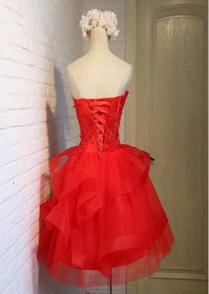 Charmantes A-Linien-Spitzen-trägerloses kurzes Homecoming Kleid Y1107