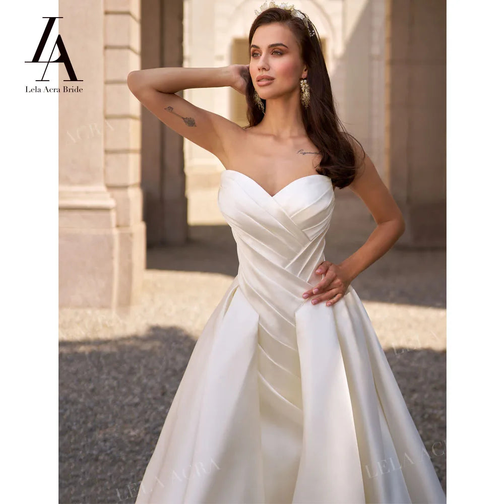 LelaAcra Sleeveless Satin A-Line Wedding Dress 2026 Sweetheart Backless Princess Bride Gown SM184 Plus Size Vestido De Noiva