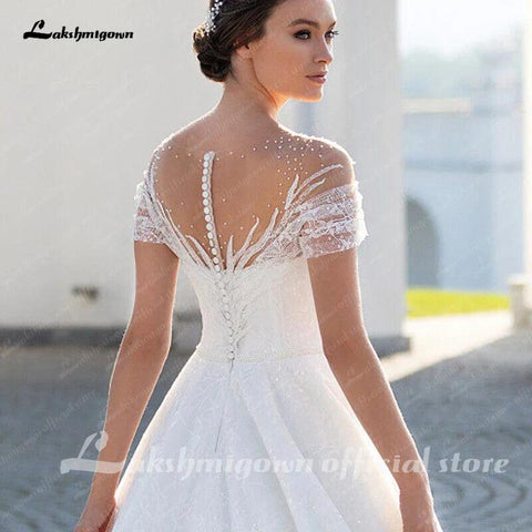 NumberSea Funkelndes schulterfreies Brautkleid, elegantes A-Linien-Brautkleid aus Glitzerspitze mit Illusionsfalten und kurzen Ärmeln 