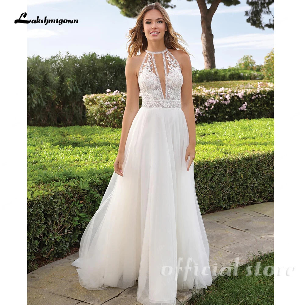 Lakshmigown Halter Neck Tulle Wedding Dresses Sexy Sleeveless Bridal Gowns with Sweep Train and Button Back Customized