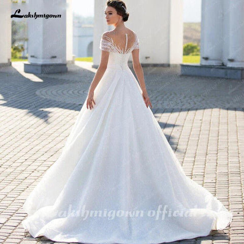 NumberSea Funkelndes schulterfreies Brautkleid, elegantes A-Linien-Brautkleid aus Glitzerspitze mit Illusionsfalten und kurzen Ärmeln 