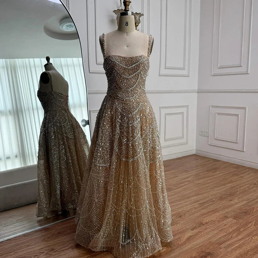 Abito da sera lussuoso color nude a linea A con perle e cristalli LA72983A