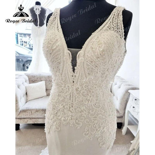 Vestido de novia de playa para mujer NumberSea Sexy con escote en V, aplicaciones de encaje con corte, sin mangas y estilo sirena/trompeta 2025