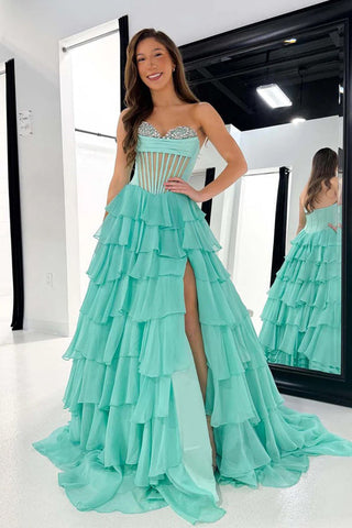 Vestido de baile verde com corpete transparente sem alças e saia com folhos PSK688