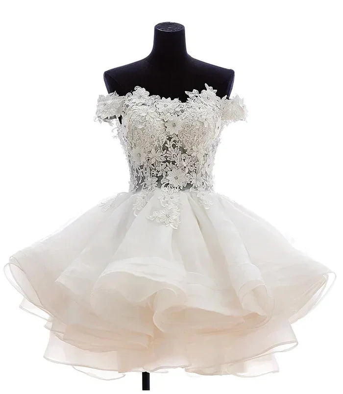 Teresia | Vestido de fiesta de línea A, de encaje y organza, con aplicaciones y tirantes caídos
