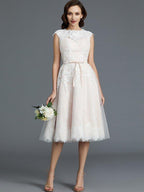 A-Line/Princess Sleeveless Bateau Knee-Length Tulle Wedding Dresses