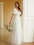 Abito da sposa in tulle e pizzo a linea A/princess, scollo a V, maniche corte e lunghezza totale