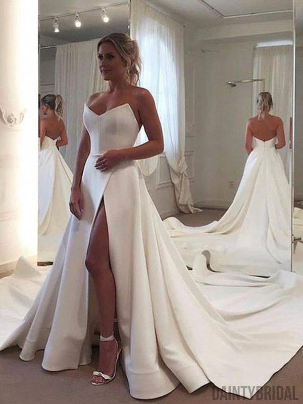 Elegantes vestidos de noiva com decote em coração e racha lateral, cauda longa. DB10112