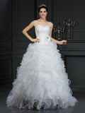 Robe de mariée longue en organza sans manches, faite main avec fleurs et décolleté cœur, style robe de bal