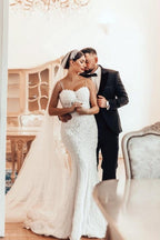 Schönes langes Meerjungfrau-Spaghettiträger-Spitzenkleid ohne Ärmel für die Hochzeit