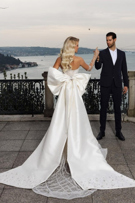 Schönes trägerloses Herzausschnitt-Mermaid-Hochzeitskleid mit Kapellenzug