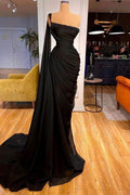 Vestidos de noche sirena largos negros con un hombro, volantes y abalorios