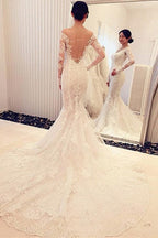 Robe de mariée sirène en dentelle avec manches longues et décolleté bustier charmant