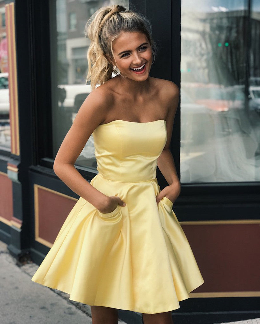 Lindos vestidos de baile curtos em cetim com corte A e bolsos, em tom amarelo
