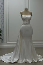 Designer Meerjungfrau Satin Trägerlos Ärmellos Elfenbein Brautkleid mit Perlenstickerei