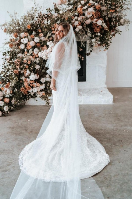 Designer V-Ausschnitt Ärmelloses Meerjungfrau Brautkleid Mit Spitze