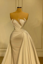 Elegantes langes weißes Meerjungfrau-Brautkleid ohne Ärmel mit Glitzer und Spitze