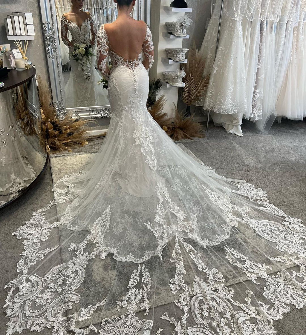 Fabelhaftes langes Meerjungfrauen-Brautkleid mit V-Ausschnitt, langen Ärmeln, Spitze und Kapellenzug