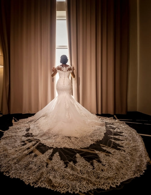 Glamouröse lange Meerjungfrauen-Brautkleider mit Applikationen, langen Ärmeln und Spitze