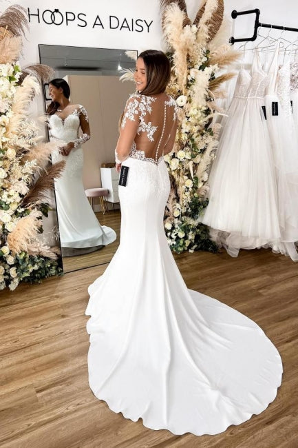 Glamouröses Meerjungfrauen-Brautkleid mit langen Ärmeln, durchsichtigem Rücken und Blumen-Spitze