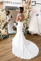 Glamouröses Meerjungfrauen-Brautkleid mit langen Ärmeln, durchsichtigem Rücken und Blumen-Spitze