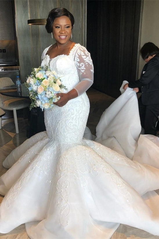 Prächtiges Meerjungfrau-Spitzen-Brautkleid mit Kapellenschleppe, langen Ärmeln und Applikationen