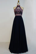 Robe de bal noire longueur sol ligne A à bretelles nuque avec broderies fleuries