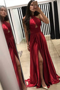 Vestido de fiesta satinado con escote halter, volantes y abertura lateral en corte largo tipo A