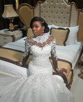 Robe de mariée longue sirène col haut avec perles, dentelle et applications à manches