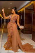 Robe de bal sirène en perles de luxe à manches longues avec traîne en tulle