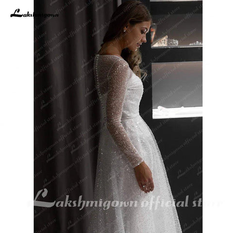 Vestido de noiva estilo boho, corte A, estilo praia, com mangas transparentes e cauda comprida, feito à medida 