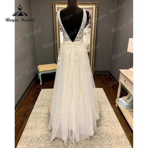 Vestido de novia boho playero sin mangas con escote profundo en V, aplicaciones de encaje, espalda descubierta, largo hasta el suelo y tul 2025 para boda civil