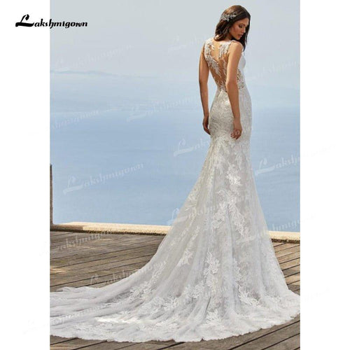 NumberSea Robe de mariée sirène charmante en tulle et satin doux, décolleté en V, sans manches, avec applications de dentelle illusion et traîne chapelle, robe de mariée Trouwjurk