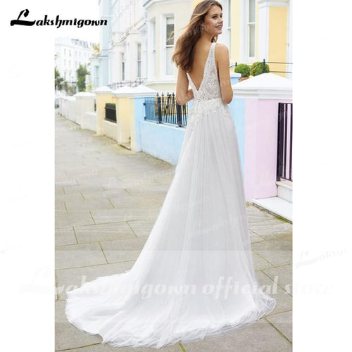 Robe de mariée NumberSea à encolure en V profond et dos nu avec dentelle