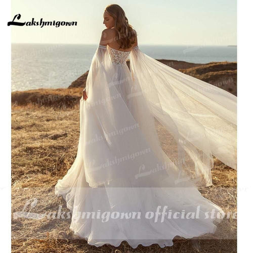 Robe de mariée boho NumberSea à encolure en V profond avec dentelle sexy et manches en tulle sans manches