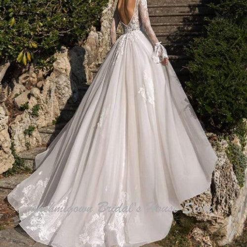 Robe de mariée luxueuse NumberSea à col profond en V et manches longues