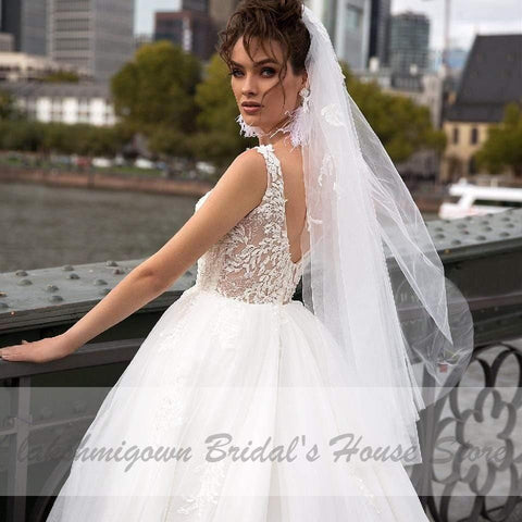 NumberSea Luxus Tüll Mariage Open Back Spitze Perlen Brautkleider