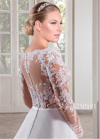 Vestido de noiva NumberSea Maravilhoso em tule, decote em V, corpete transparente, corte A, mangas compridas, costas ilusionistas